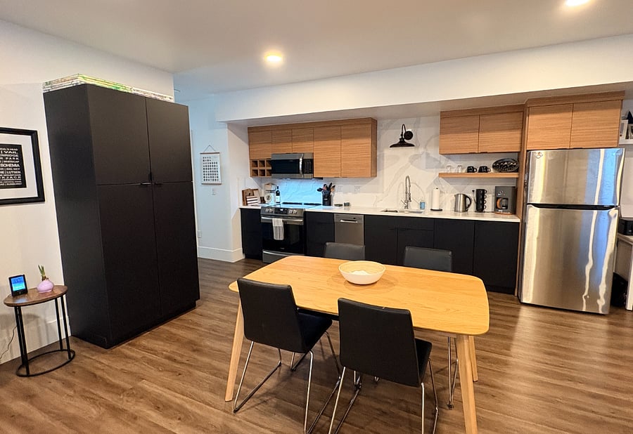Kitchen with full-size oven, microwave, dishwasher, full-size refrigerator, coffeemaker, dishes/cookware/utensils