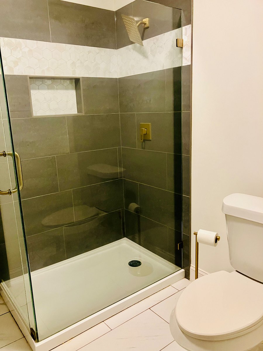 Clean shower with a modern, refreshed feel.