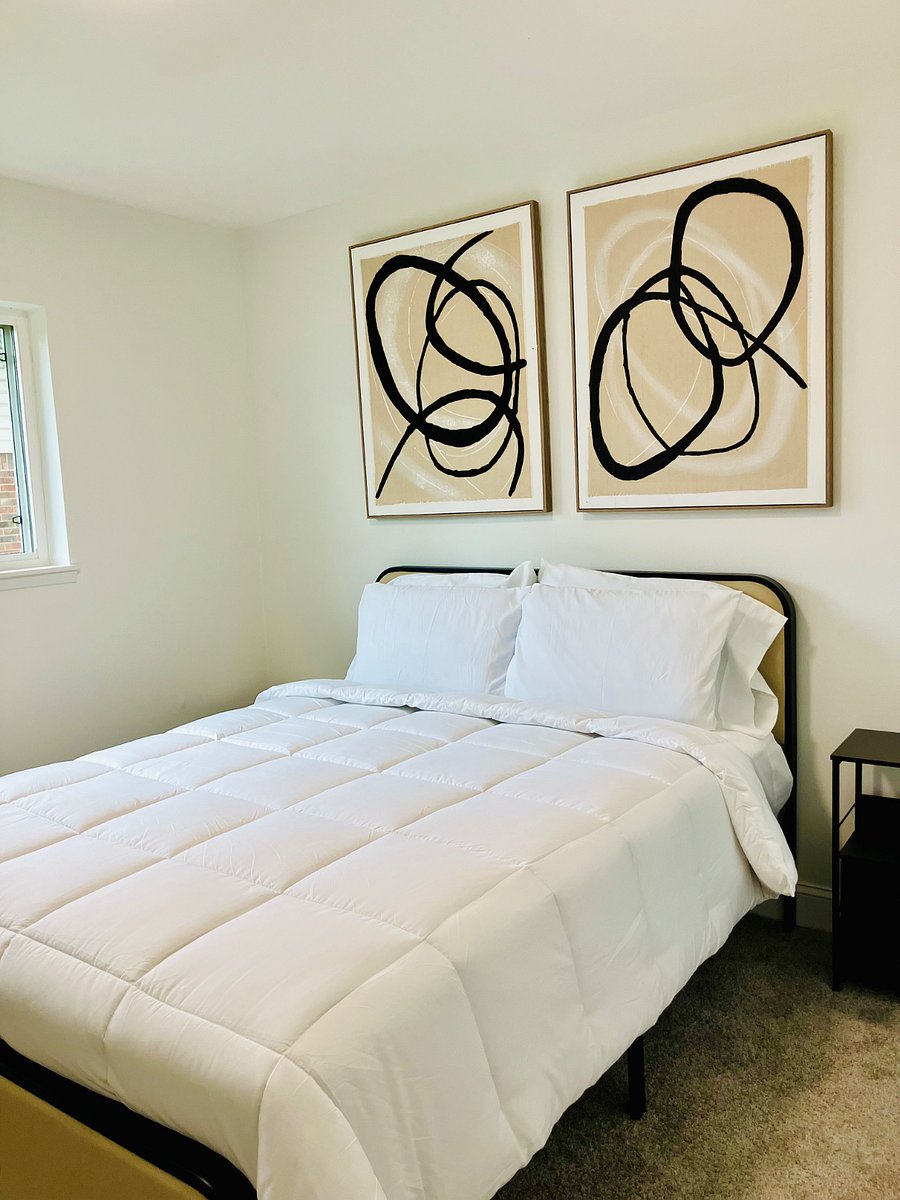 Comfortable bedroom featuring a queen bed perfect for rest and relaxation.