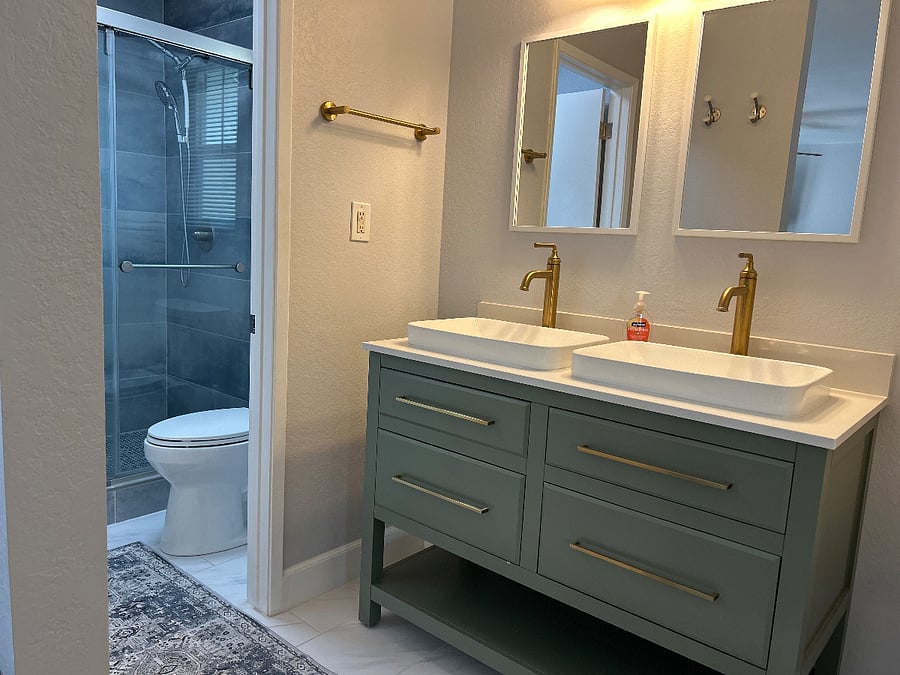 Modern/ updated bathroom with shower seat