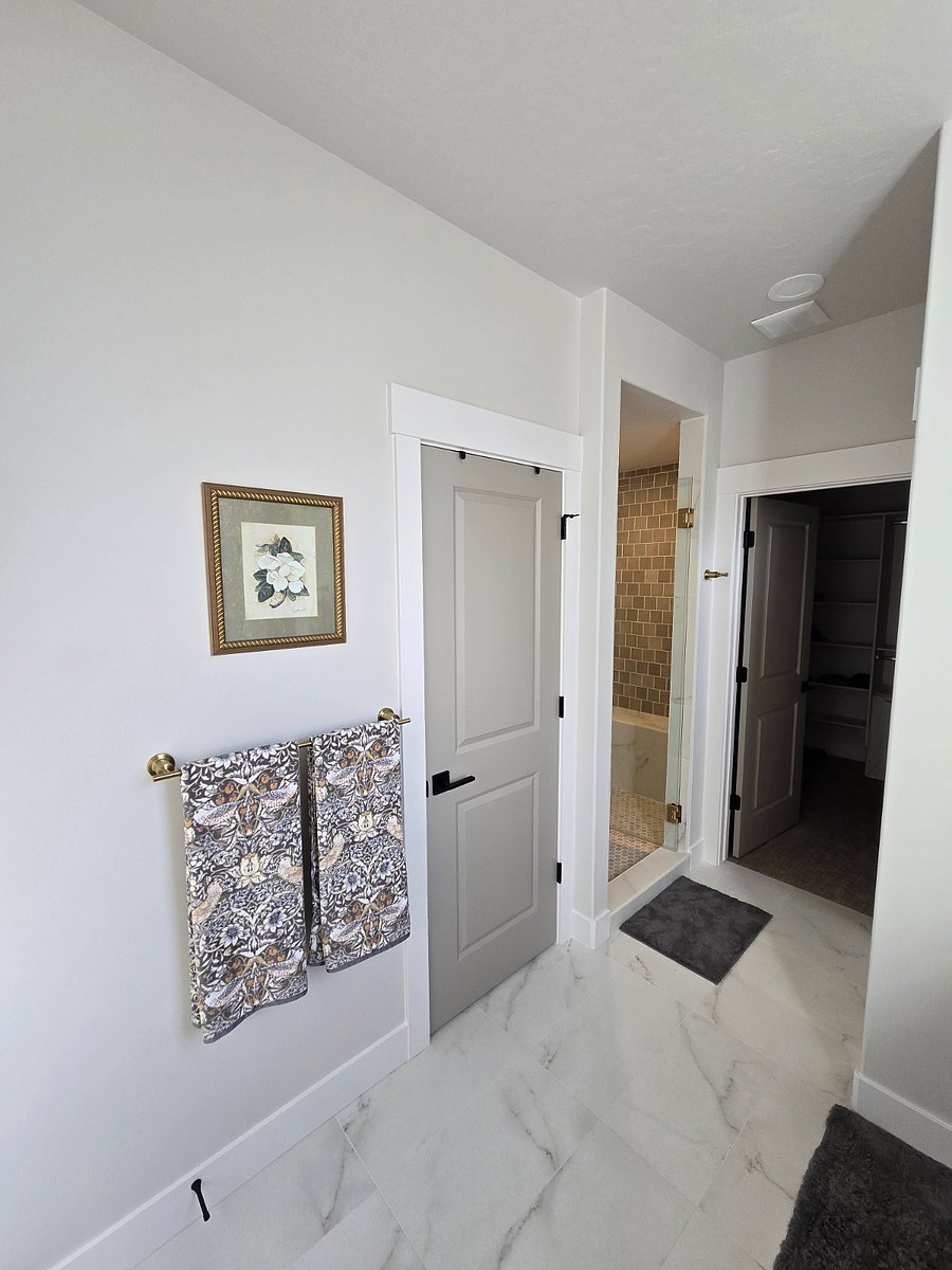 The master bathroom exudes a sense of luxury and sophistication, creating a truly prestigious and elegant space for relaxation and daily routines. 