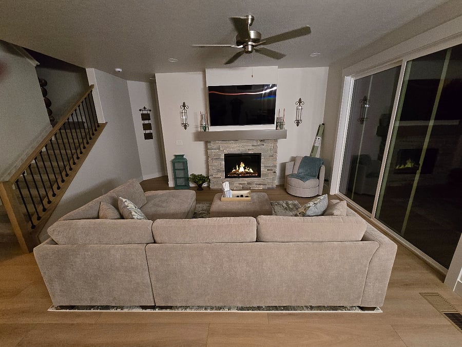 Feeling a chill? Simply turn on the electric fireplace and blower to infuse warm air into the room. For added ambiance, turn up the volume and enjoy the cozy crackling sounds of burning logs.