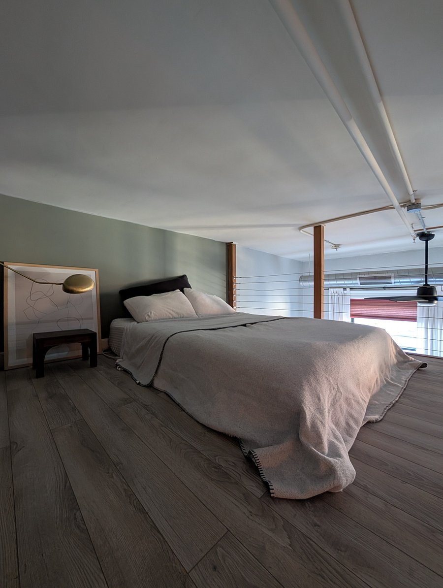 Second queen bed in loft space. 