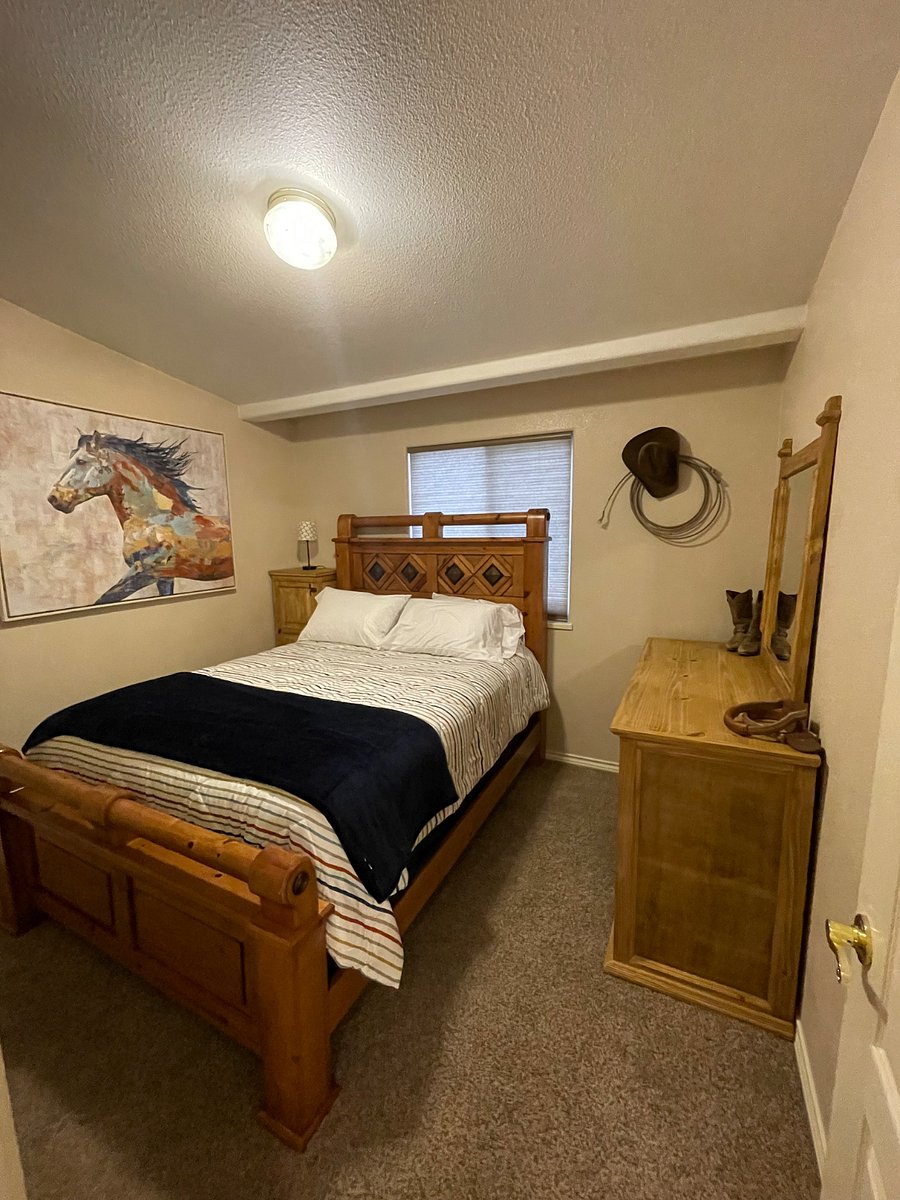 Bedroom two with queen bed.