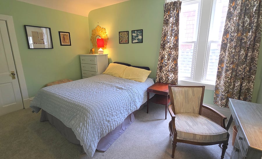 second bedroom with queen bed and super soft mattress topper