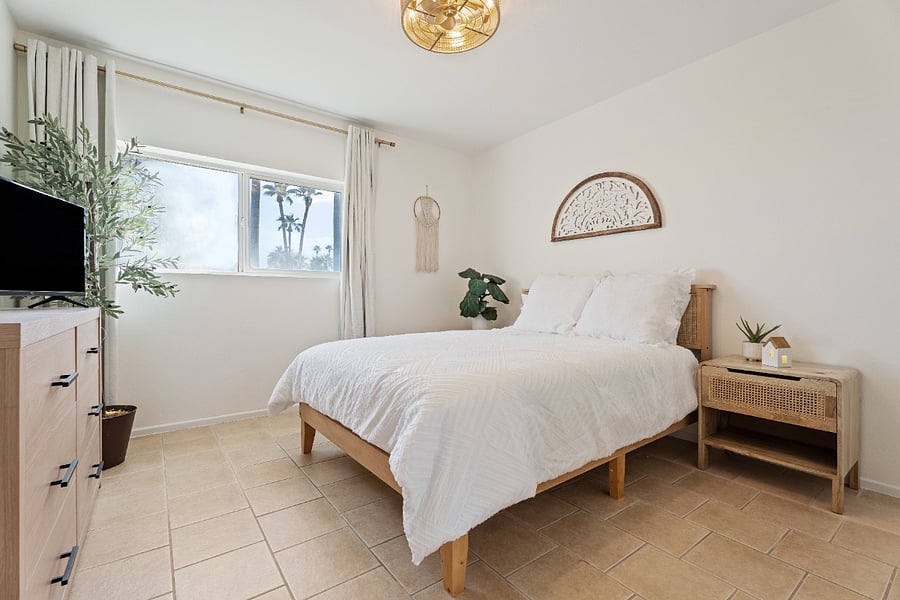Second bedroom with a queen bed.