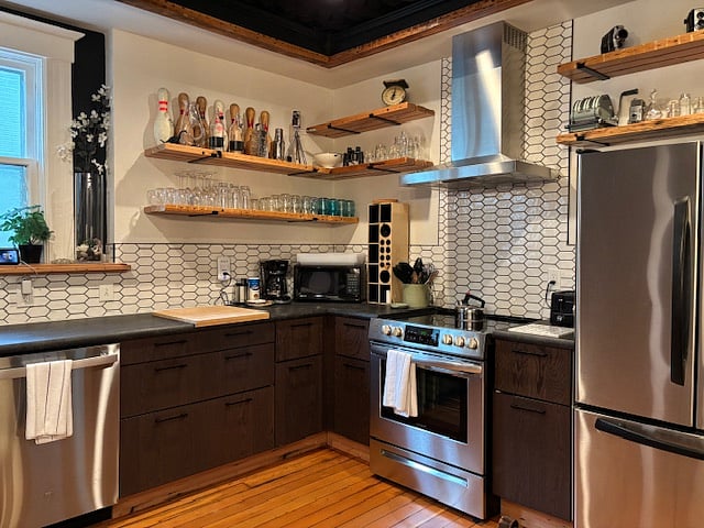Kitchen - is expansive having everything that you could want and lots of counter space and room to work. High ceilings, wood floors, and stainless steel appliances.