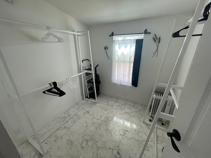 Huge Walk In Closet with Shoe Shelves