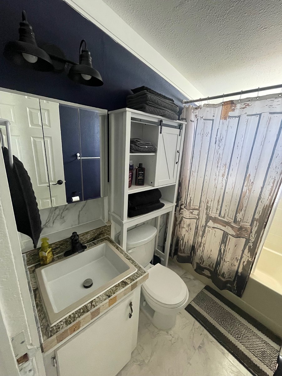 Farm House Themed Decor in Bathroom also