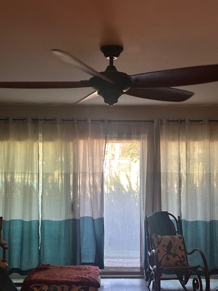 Sliding doors wall to wall from living room to patio