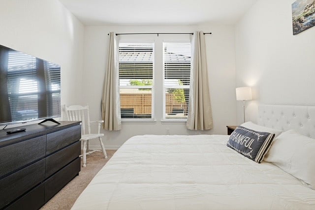 Master Bedroom with King side bed, Smart TV walking Closet and full Bathroom.