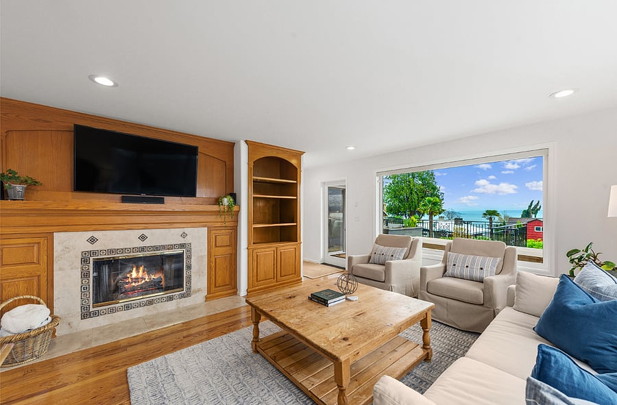 Living Room with gas fireplace and door to huge view deck