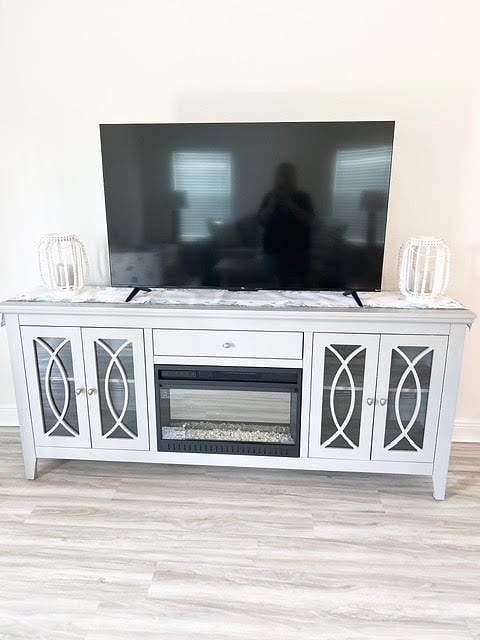 Family room entertainment center with television.