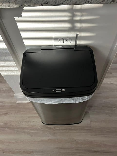 Automatic opening garbage can (interior - kitchen area).