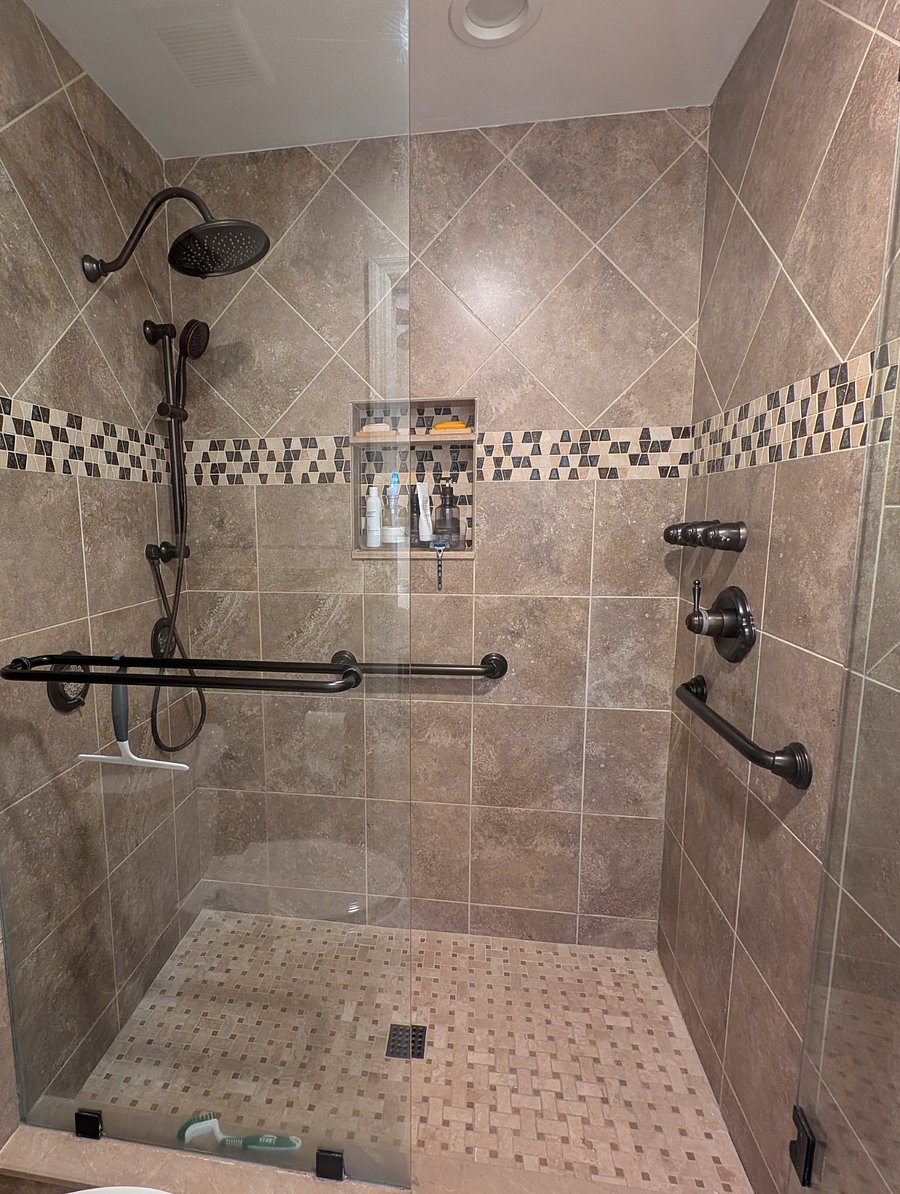 Master bathroom shower with rain shower head