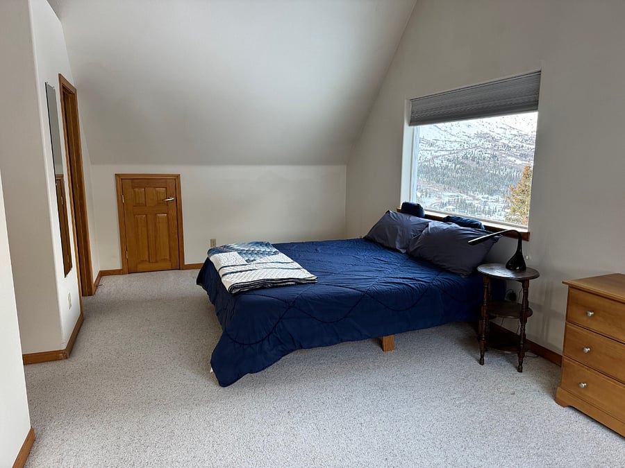 Spacious master bedroom with California King bed