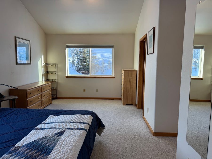 Spacious master bedroom with California King bed