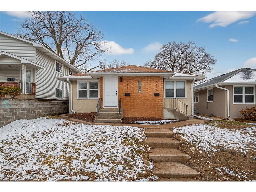 Left Door. Beautiful brick exterior. Parking in back or free in front.