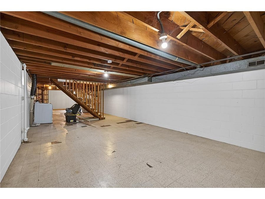 Huge basement with a washer and dryer. Plenty of room for storage!