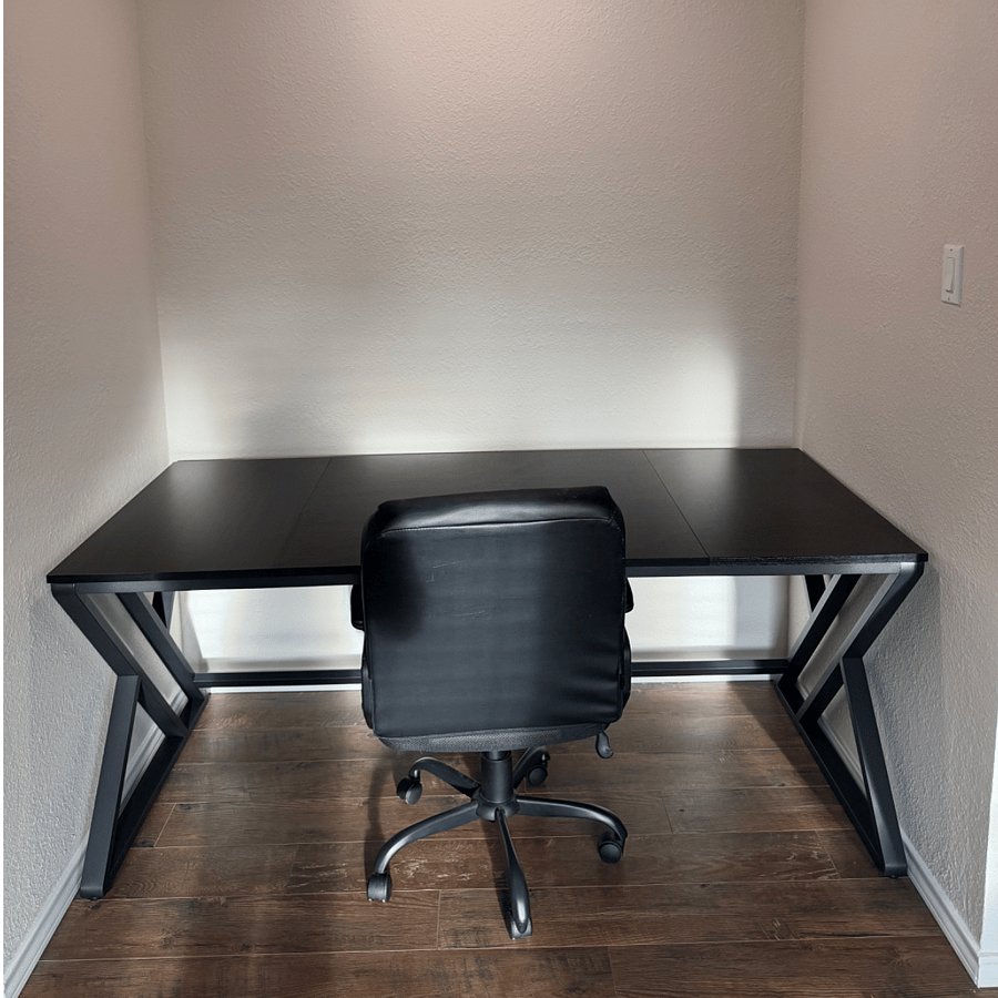 Private workspace in bedroom. 4 plug outlet located under the desk