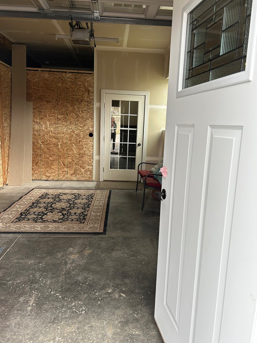 Storage/mudroom leads to studio entrance