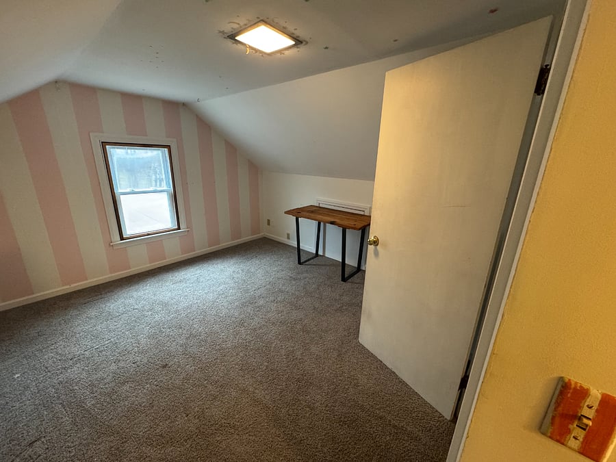 This is the other small room at the top of the stairs. Great for an office, storage, or whatever else you would like to use it for. This room has another set of built in drawers and a large 5x4 closet as well.