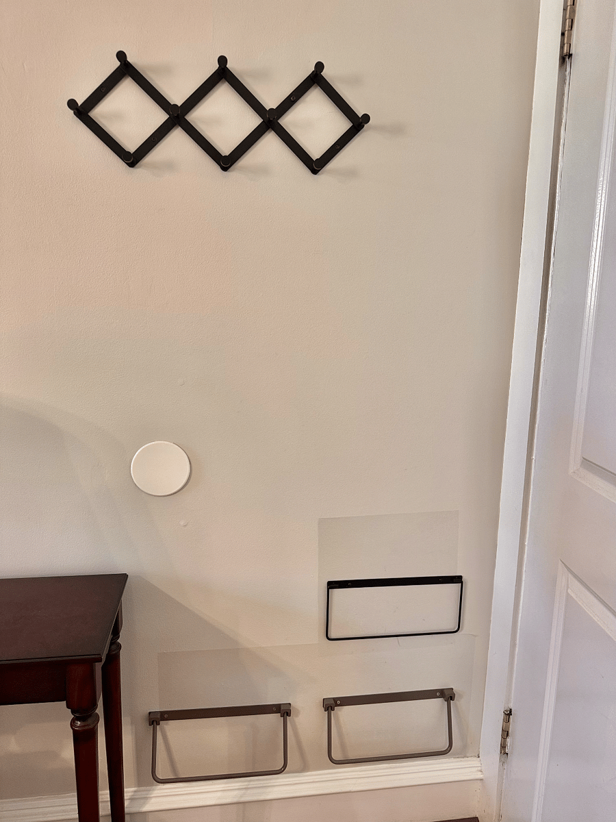 entry way with coat rack and shoe storage
