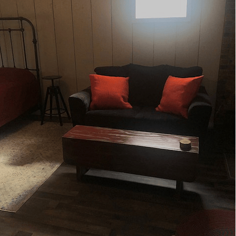 Comfy loveseat seating area.