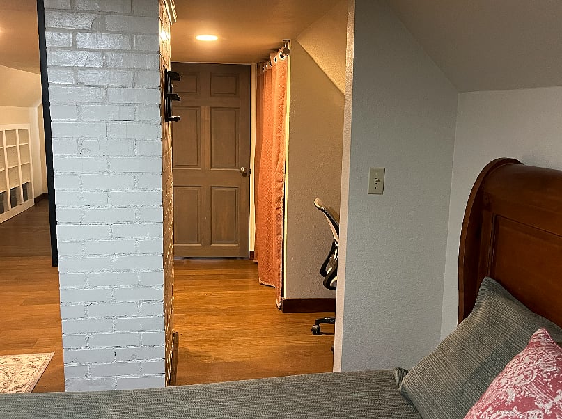 2nd-floor suite looking past the desk alcove to the bathroom door