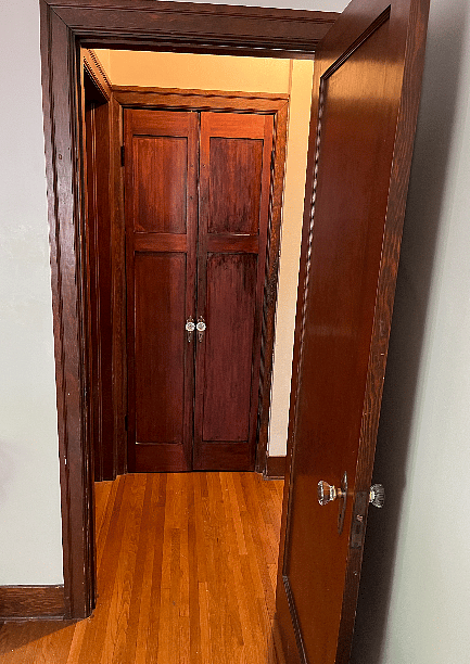 French doors leading up the stairs to the 2nd-floor suite