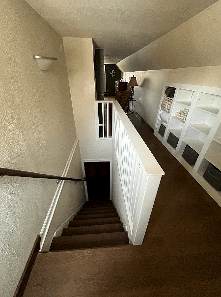 Looking down the stairs from the 2nd-floor suite
