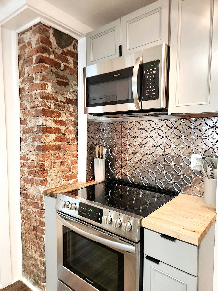 All dishes, cookware, and bakeware is included in this beautiful kitchen. It even includes an airfryer and crockpot!