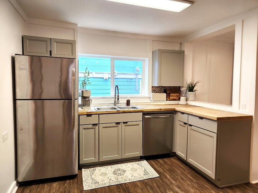 All dishes, cookware, and bakeware is included in this beautiful kitchen. It even includes an airfryer and crockpot!
