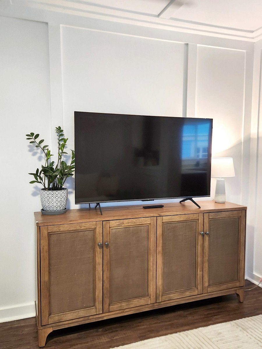 Smart TV with large storage cabinet.New
