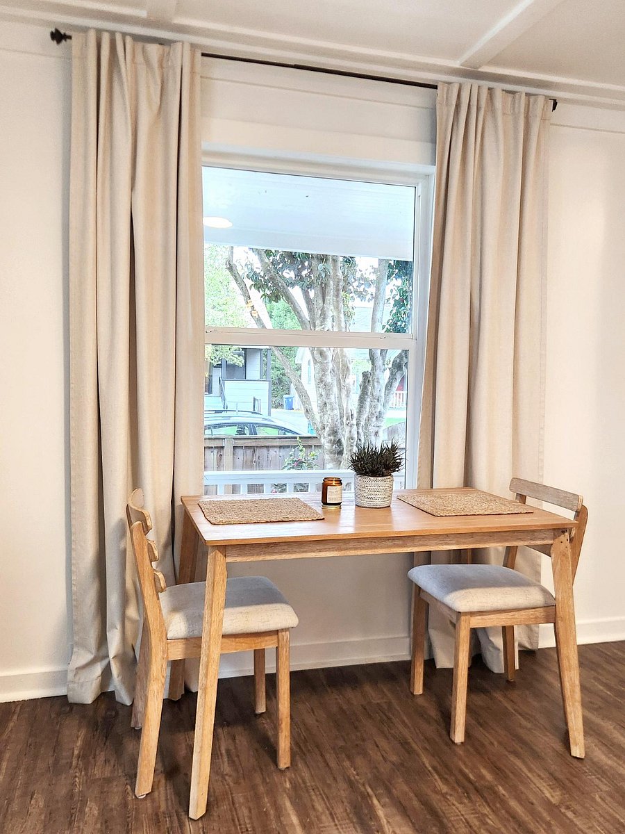 Dining Area- Can seat 4 with bench and chairs. Blackout curtains.