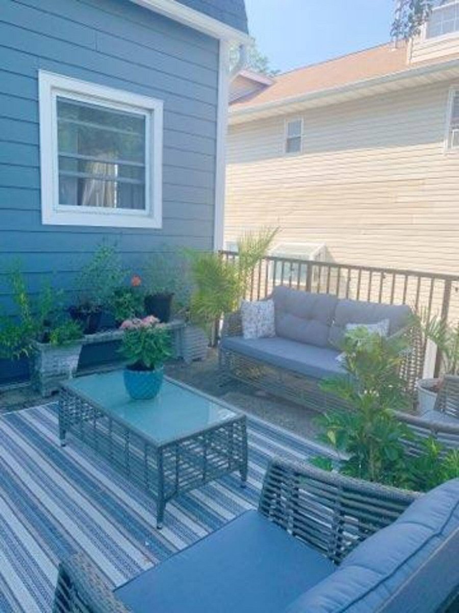 View of front terrace near entry separate entry door to apartment
