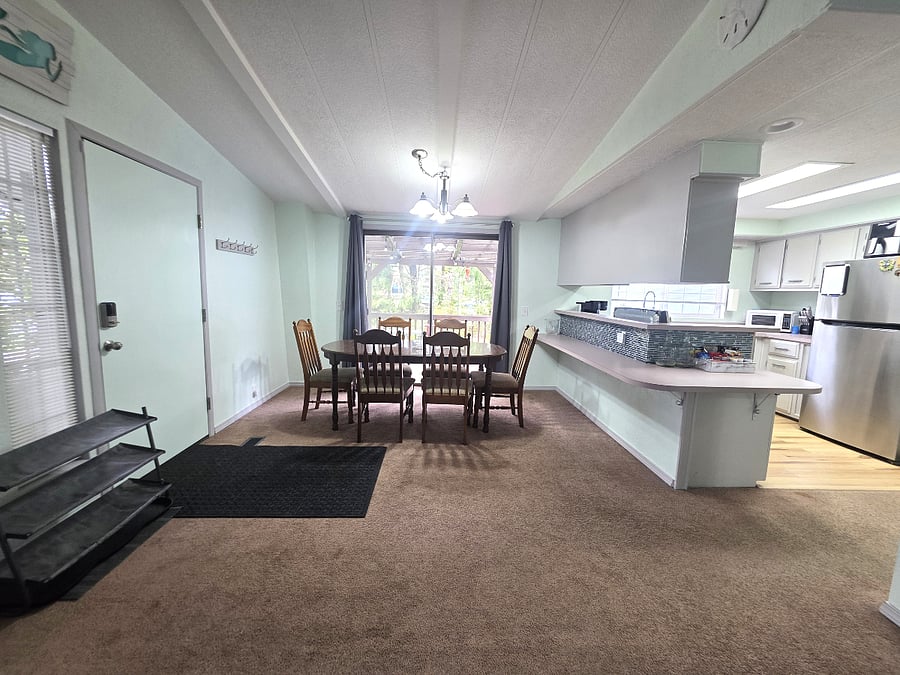 Seamless flow between living, dining, and kitchen areas
