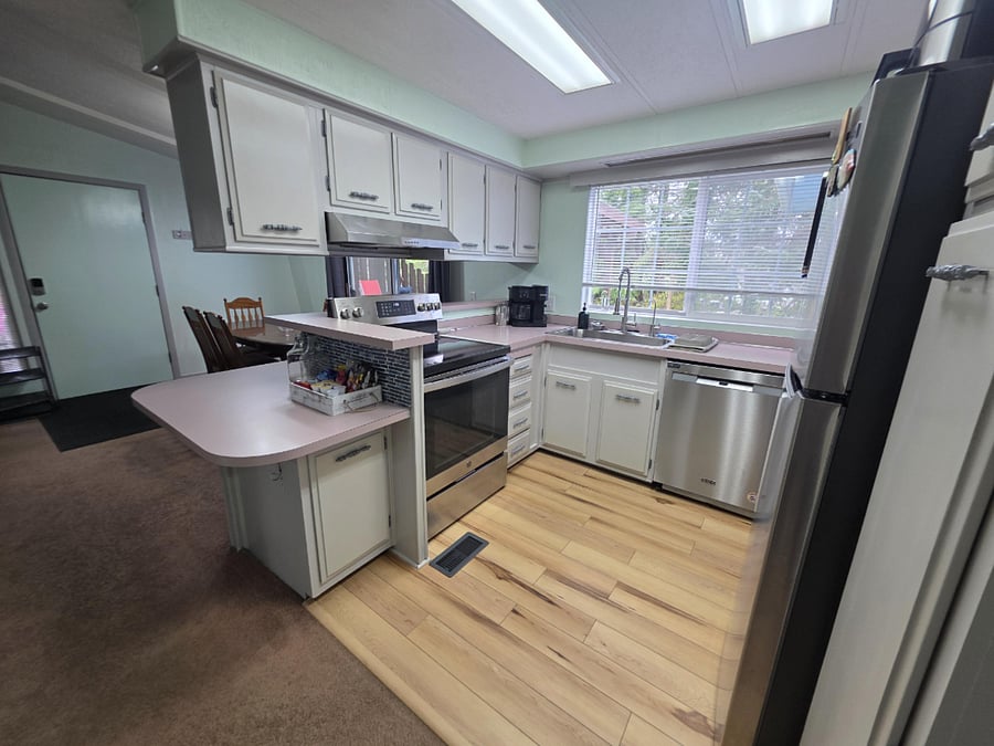 Kitchen with full size appliances and functional layout