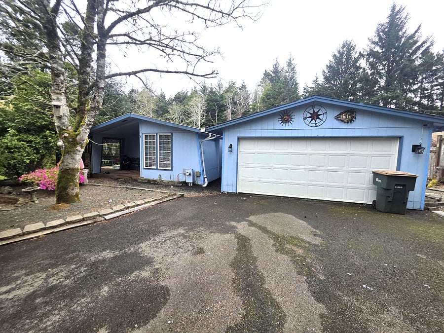 Private home with spacious yard, covered deck, and quiet setting