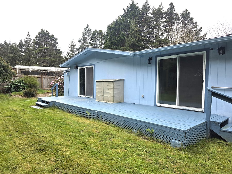 Back deck with easy access to back yard and outdoor areas