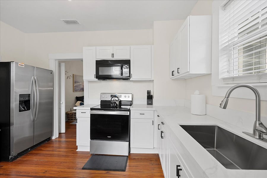 Fully stocked kitchen and full-sized refrigerator and laundry facilities.