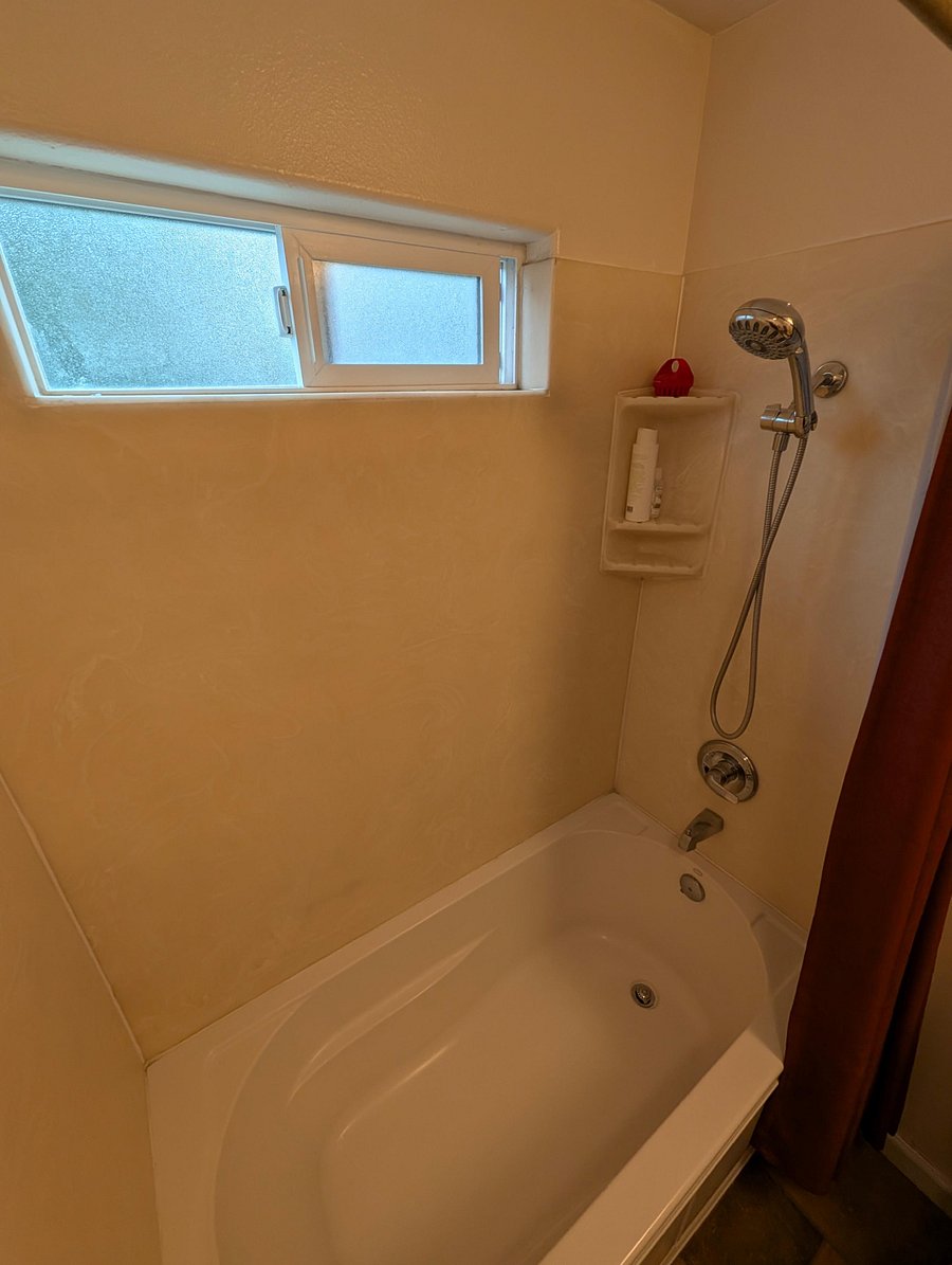 Downstairs shared bathroom tub area