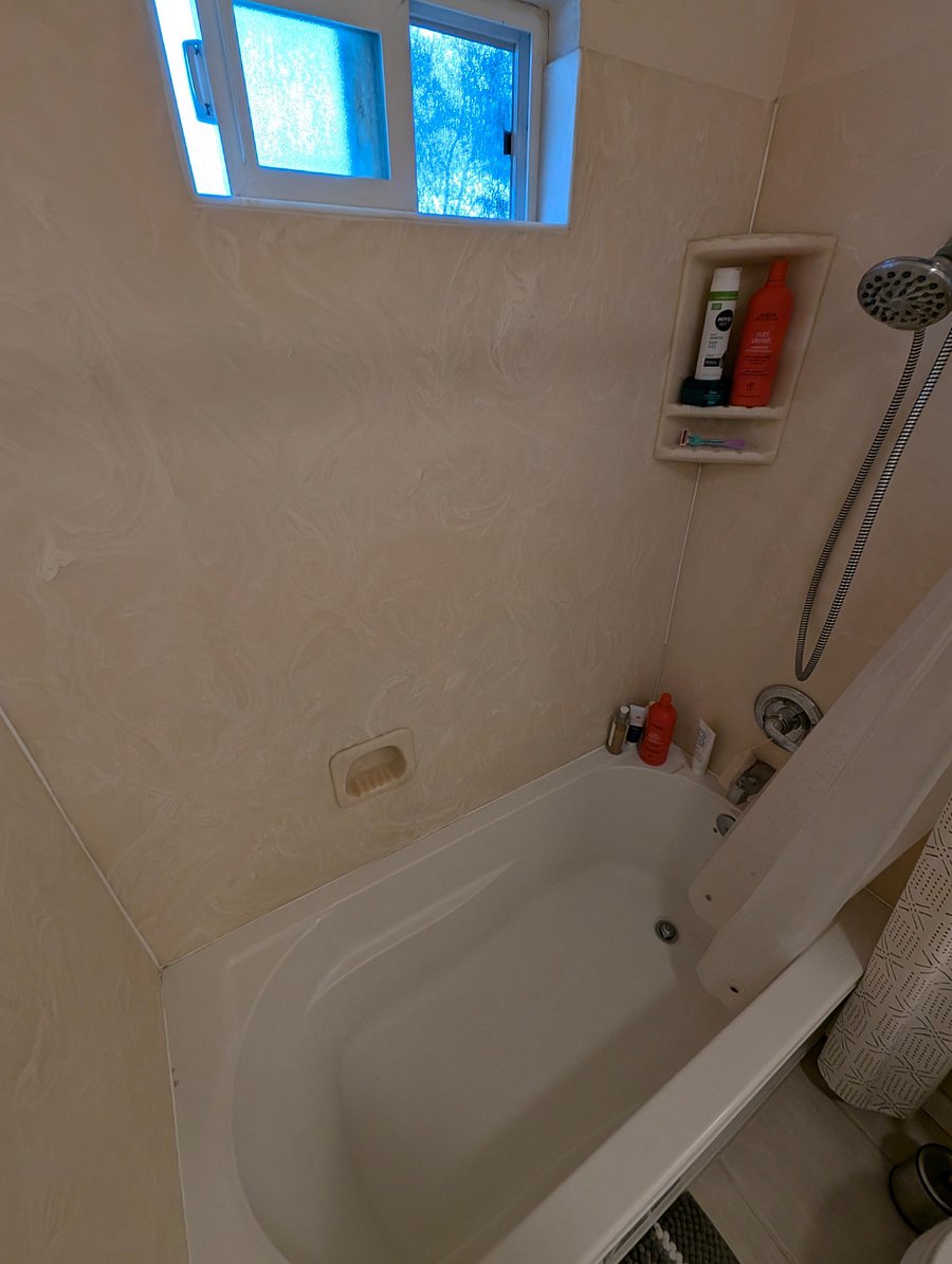 Upstairs shared bathroom tub area