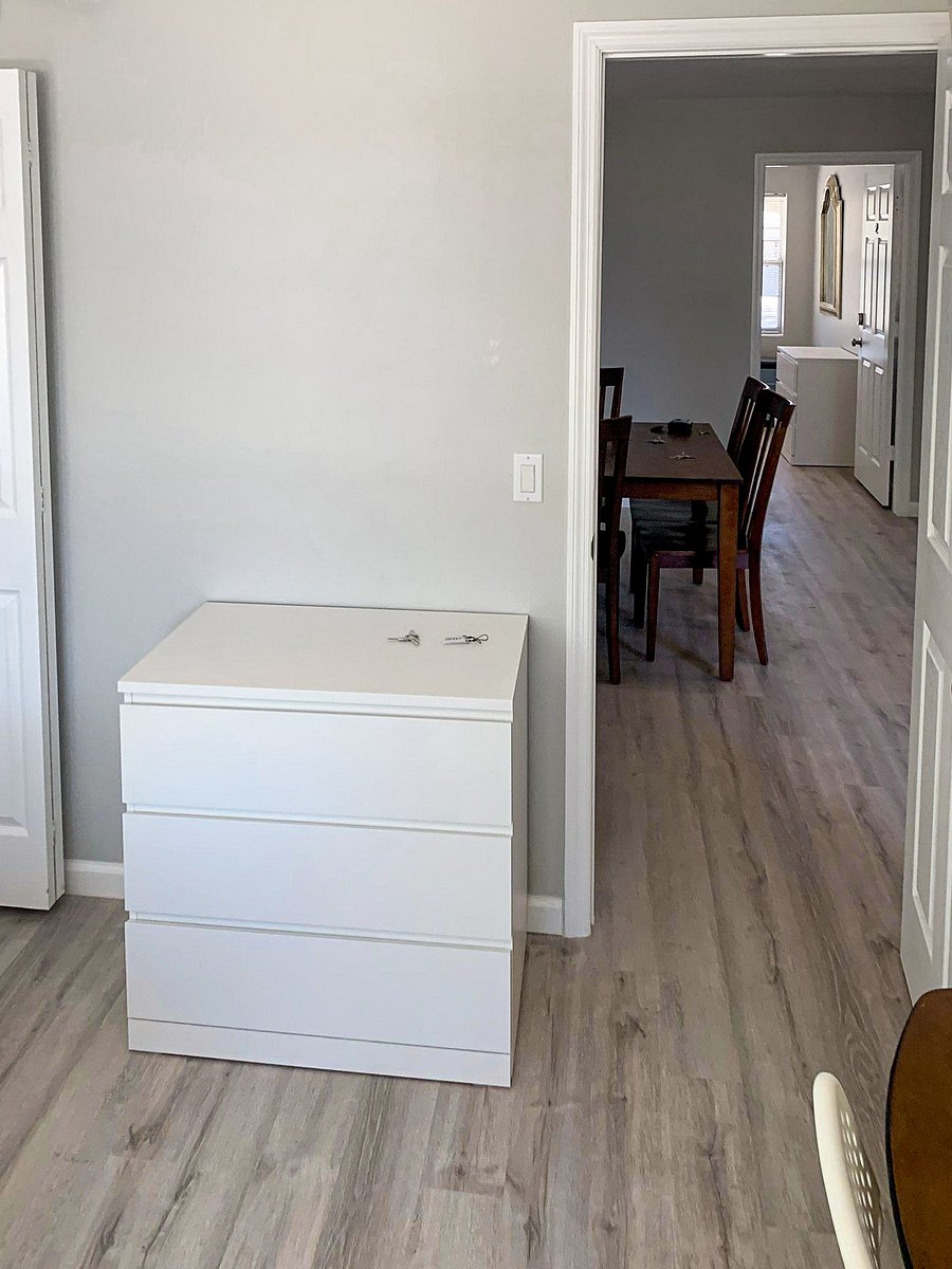 Dresser, closet to left, mini fridge is not seen
