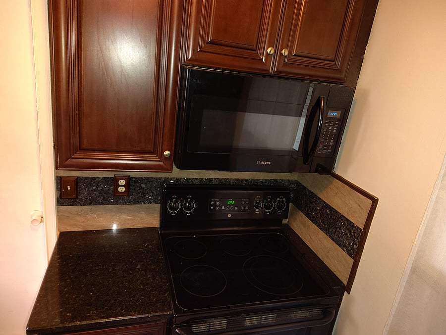 Kitchen - microwave and sto