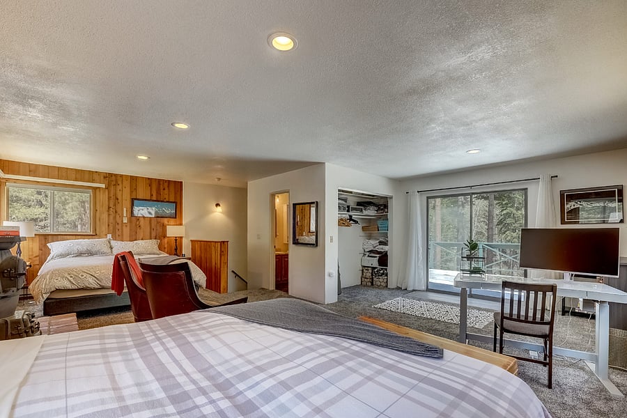 Upstairs Master with King and Queen beds with sit stand desk and monitor