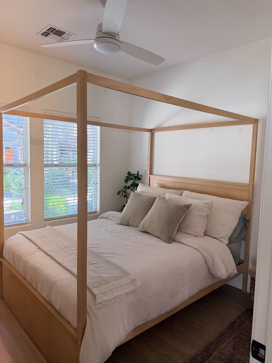 Bright, cozy bedroom with beautiful natural light and a comfortable, inviting bed. ROOM AVAILABLE.