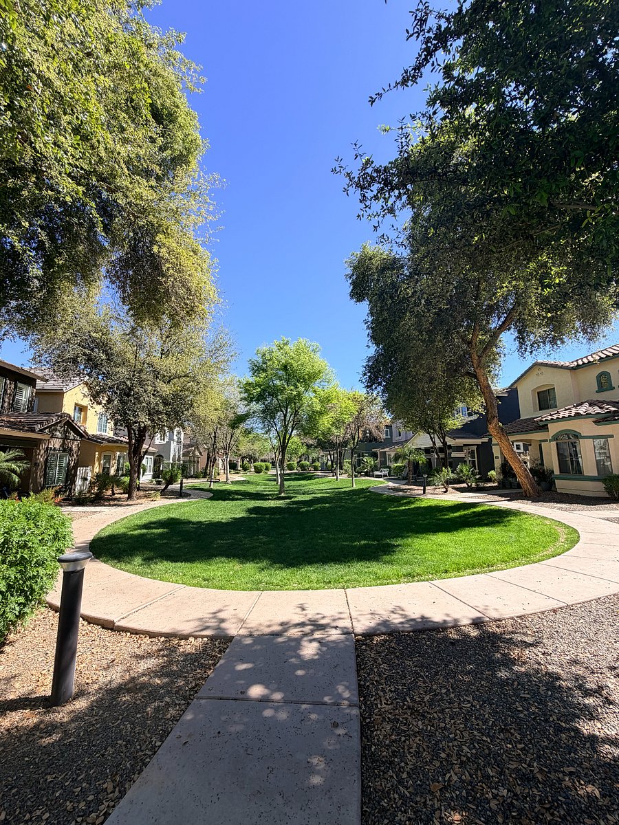 Beautiful grassy greenbelt with walking paths just steps from your front door.