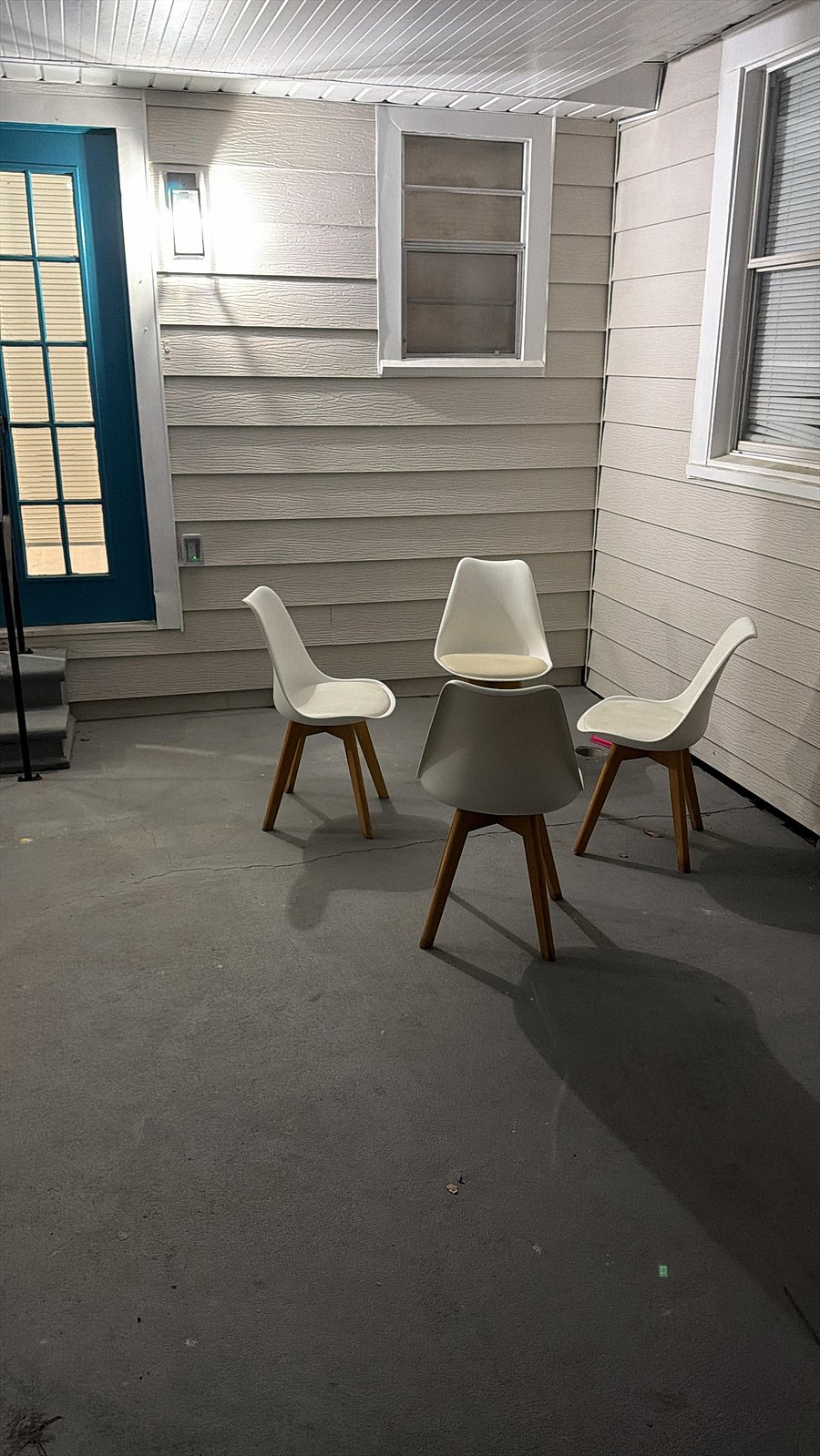 Covered back porch-patio sitting area, table coming soon. 