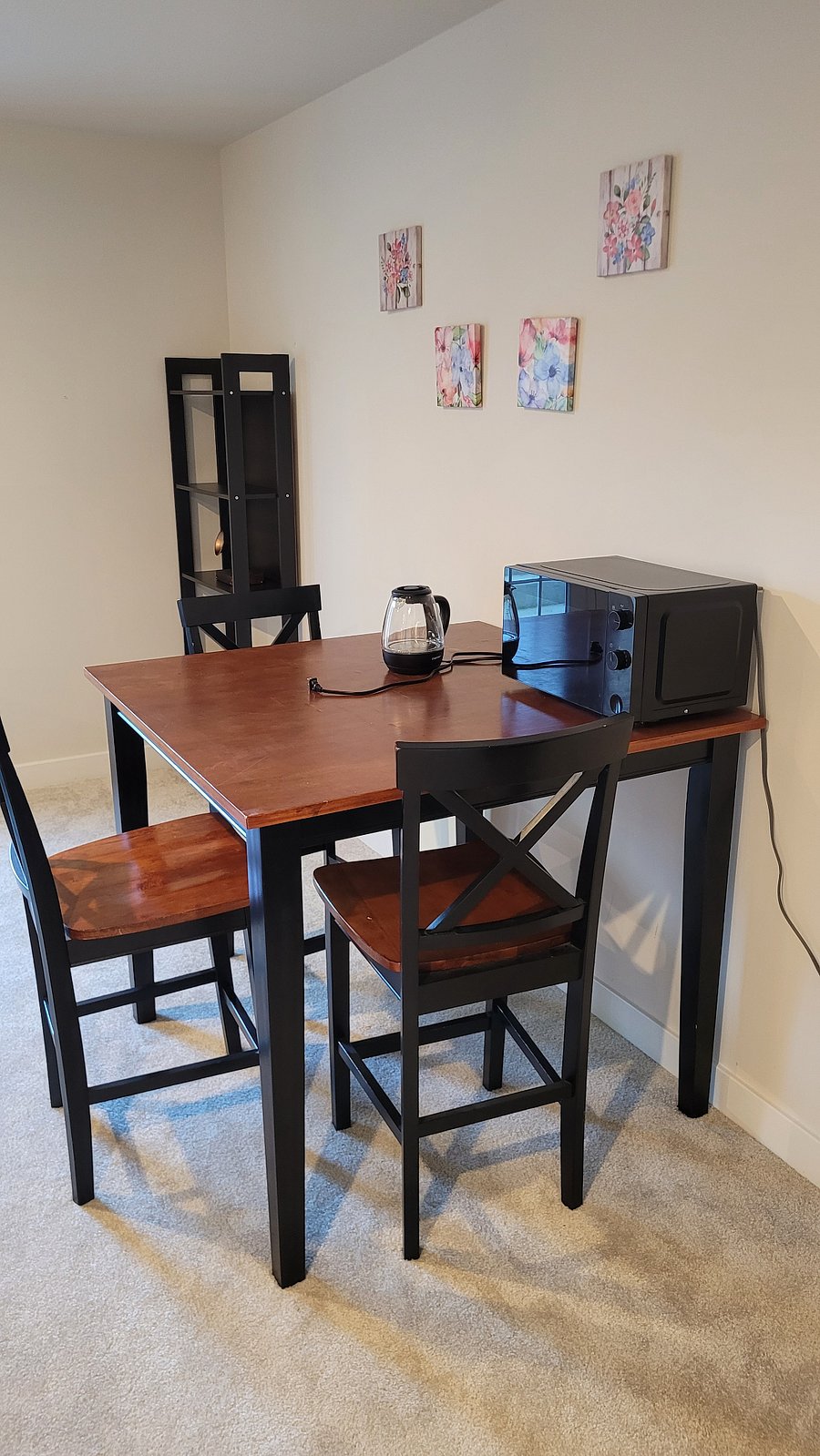 Dining table with microwave and hot water kettle